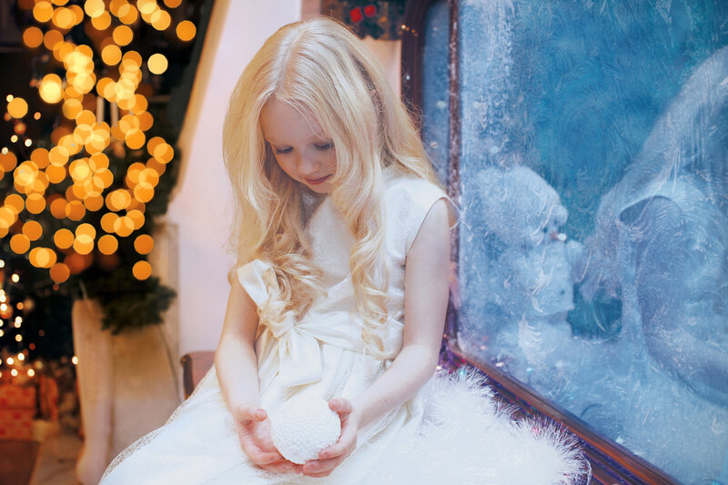 Girl Holding White Ball