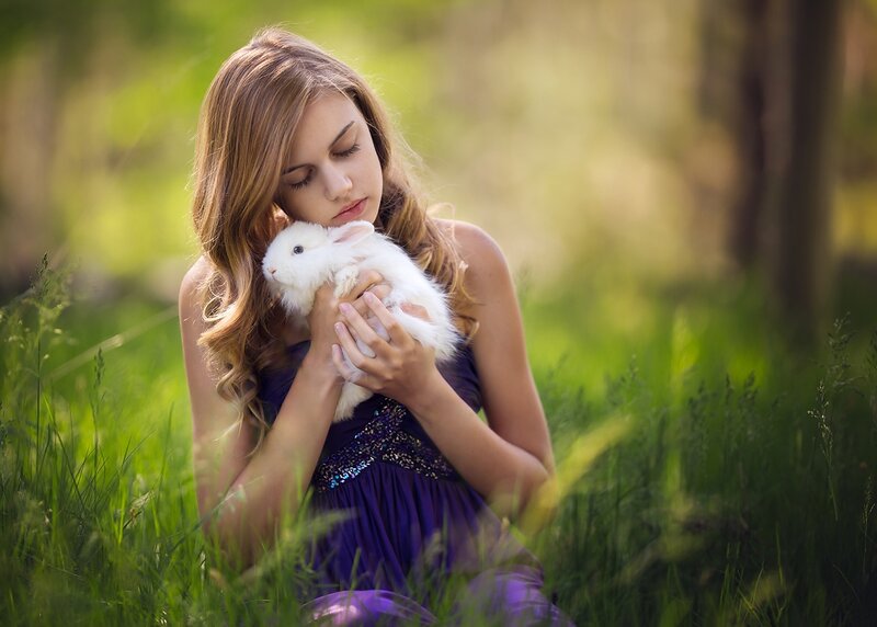 Girl Holding White Rabbit — Purple