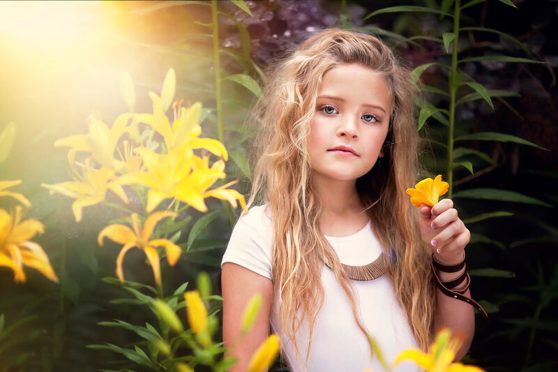 Girl Holding Yellow Flower — Serene