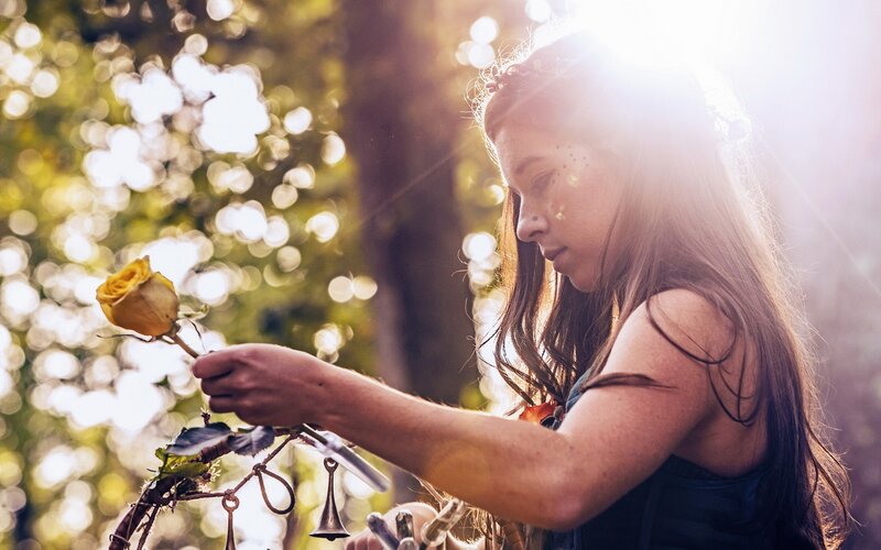Girl Holding Yellow Rose