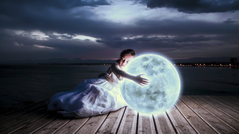 Girl Hugging a Moon