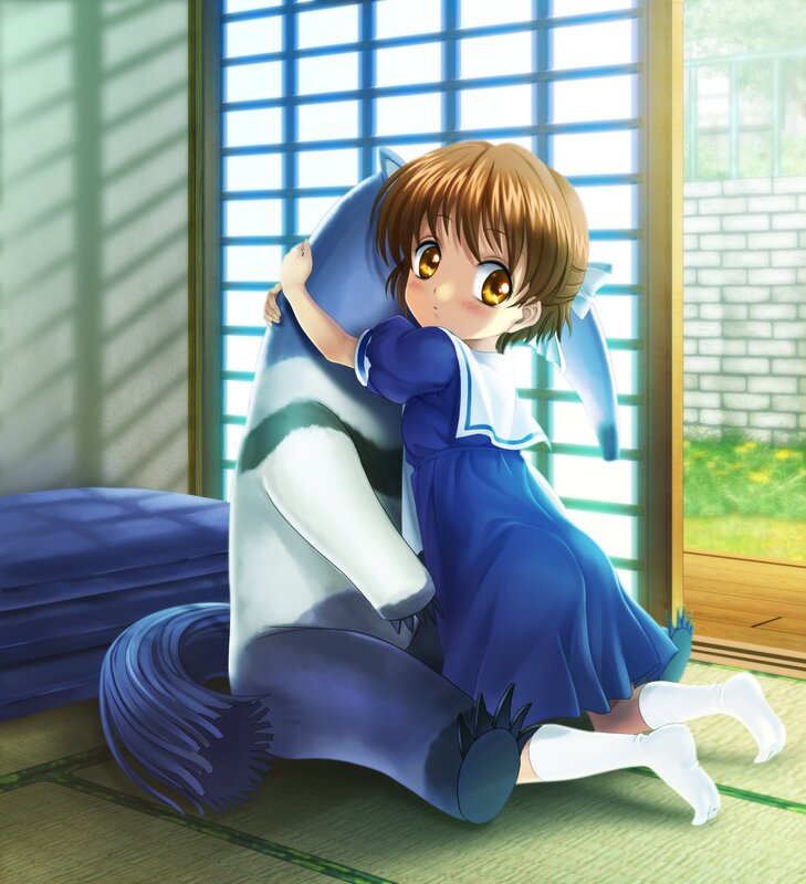 girl hugging a plush toy