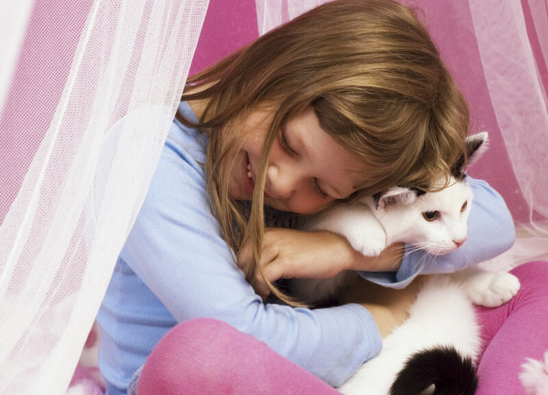 Girl Hugging Cat