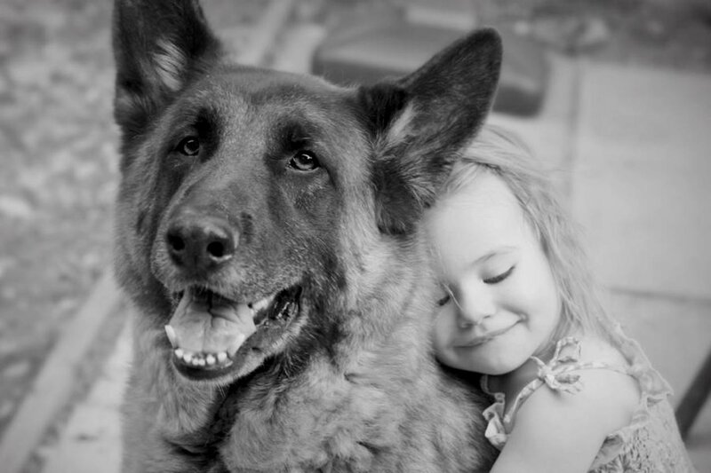 Girl Hugging Dog — Black
