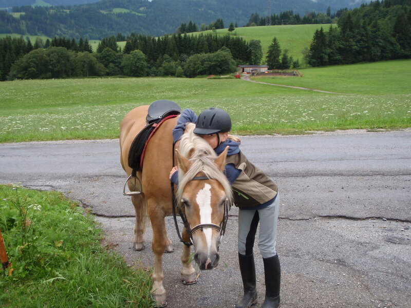 Girl Hugging Horse