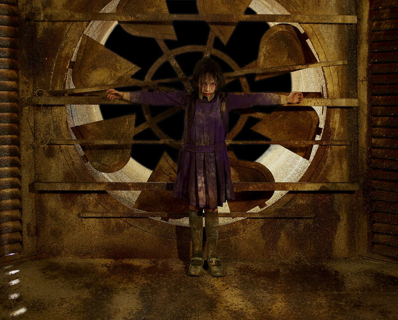 Girl in a dirty purple dress