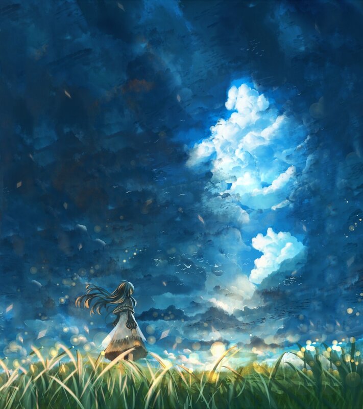 Girl in a field at dusk