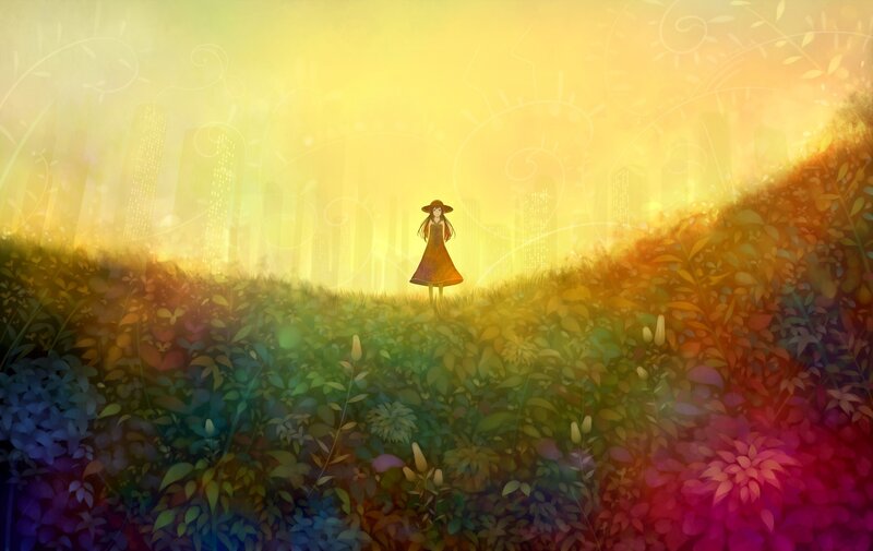 girl in a field at sunset
