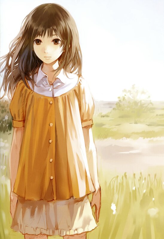 girl in a field at sunset
