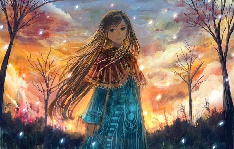 girl in a field at sunset