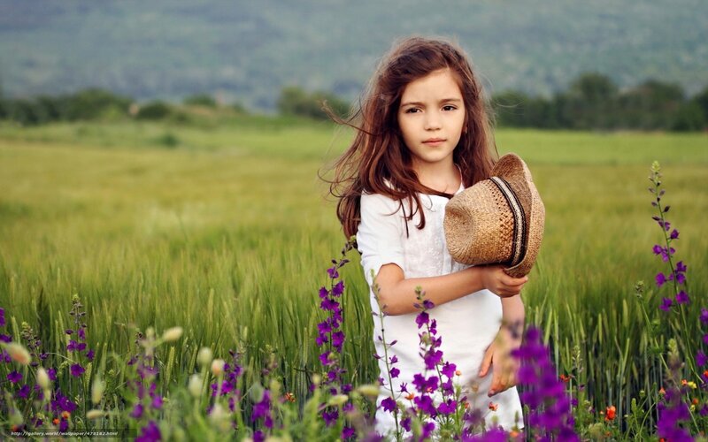 girl in a field of flowers
