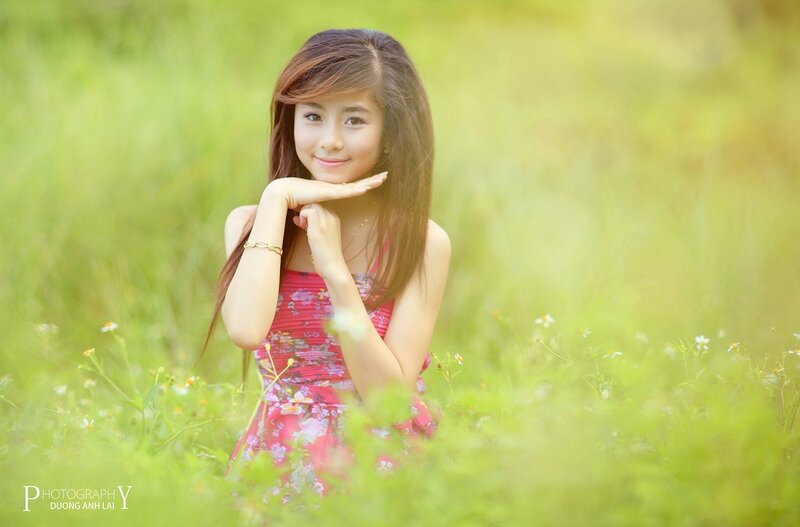 girl in a field of flowers