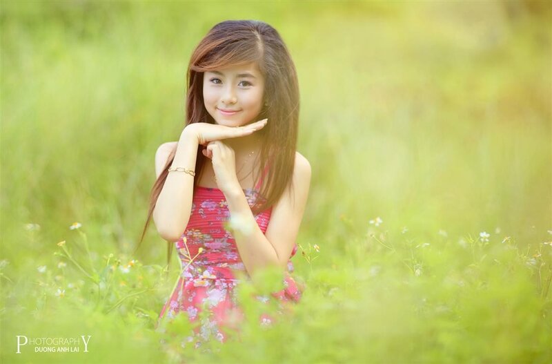Girl in a field of flowers
