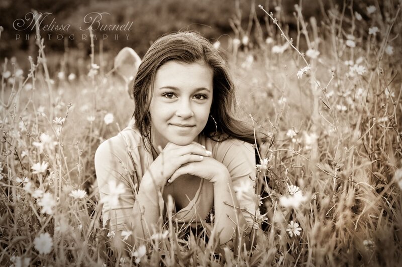 girl in a field of flowers