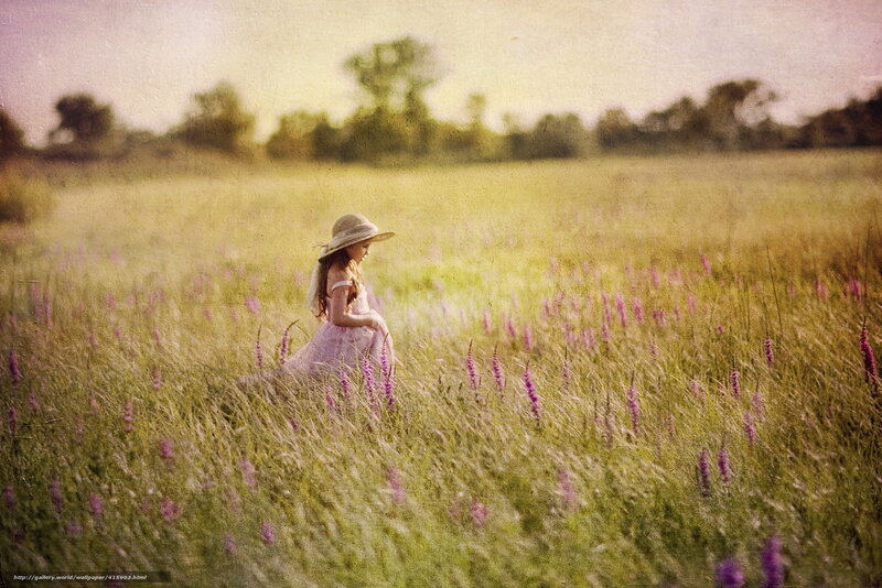 Girl in a field of flowers