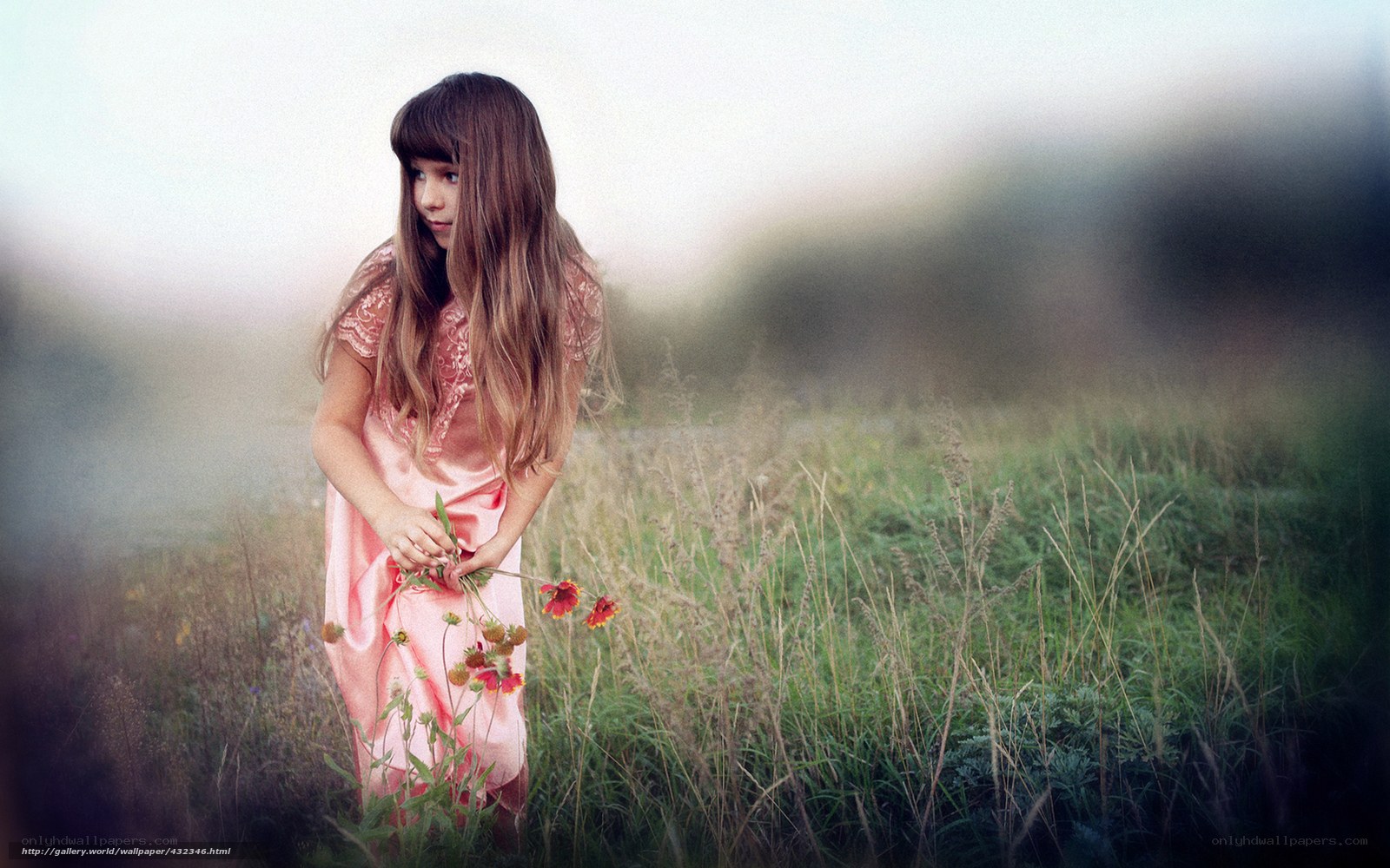 Girl in a field with flowers
