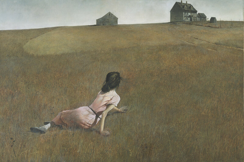 Girl in a field with house