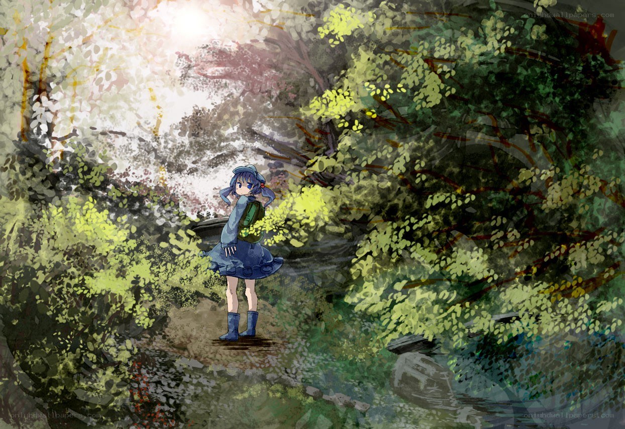 Girl in a forest clearing