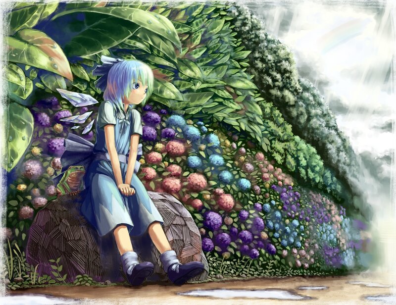 girl in a garden with rainbow