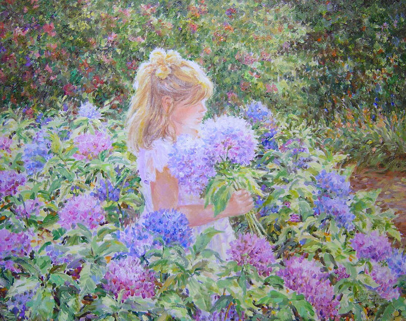 Girl in a hydrangea garden
