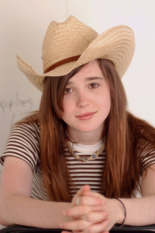 Girl in a straw cowboy hat
