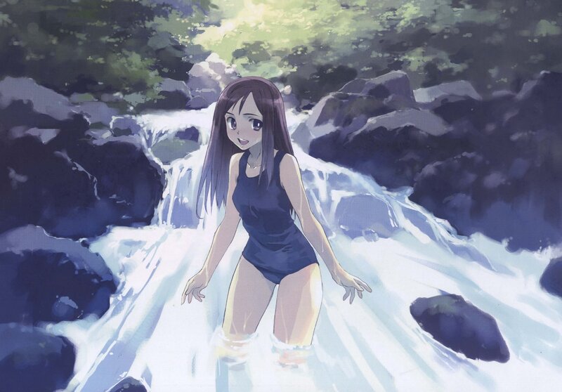 Girl in a swimsuit by the waterfall
