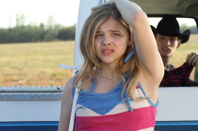 Girl in a vehicle with man