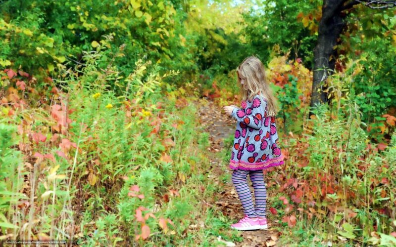 Girl in autumn forest