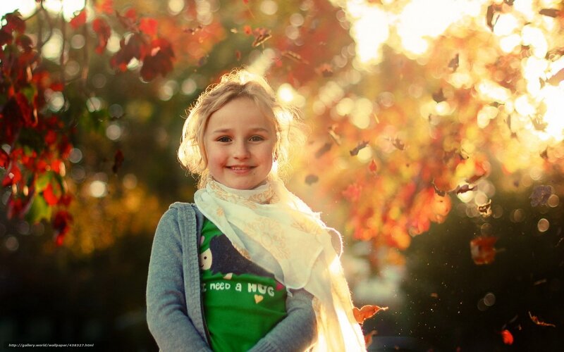 girl in autumn leaves