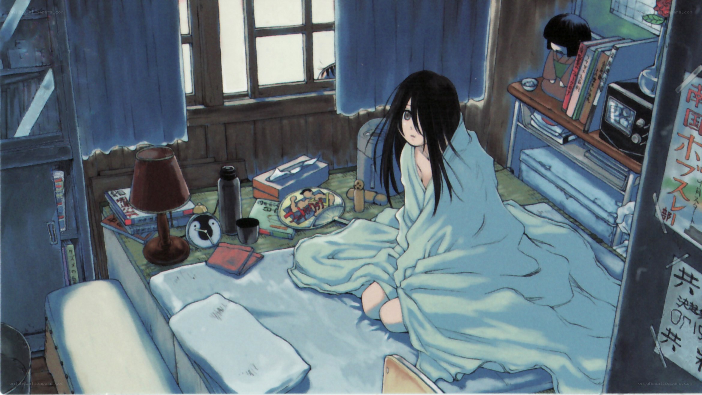 girl in bed with blanket