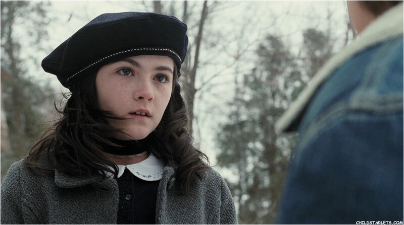 girl in black beret looking at someone