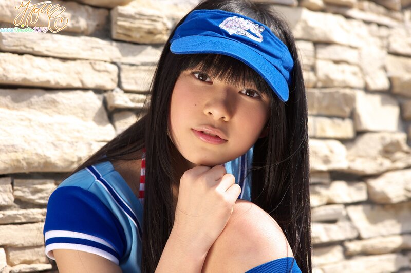 girl in blue cap and uniform