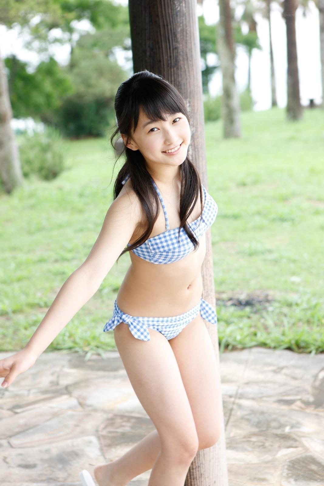 girl in blue gingham bikini