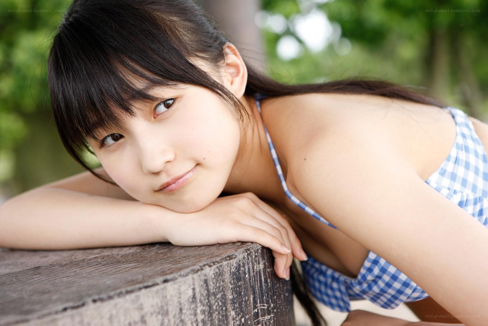 girl in blue gingham top