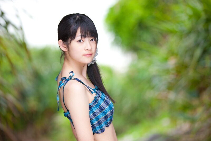 girl in blue swimsuit outdoors