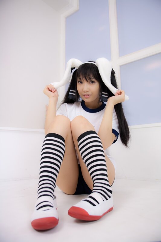 girl in bunny costume sitting