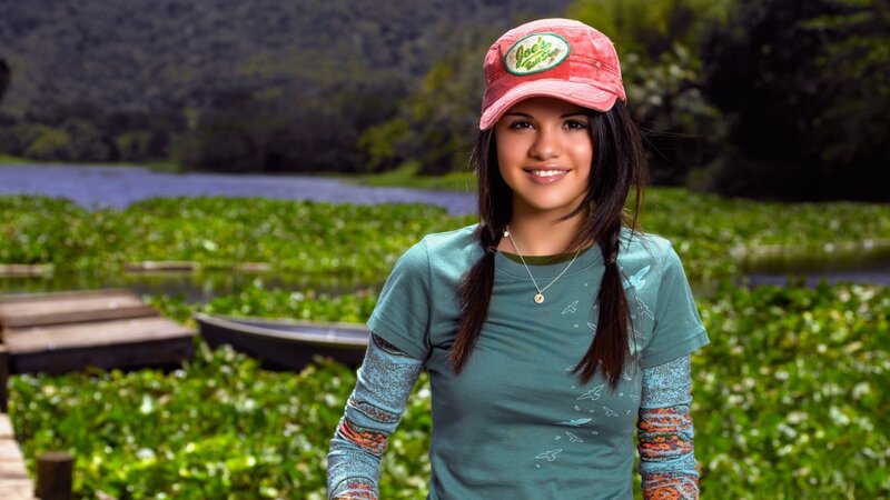 girl in cap by the lake