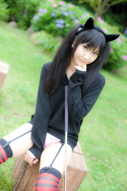 girl in cat ears posing outdoors