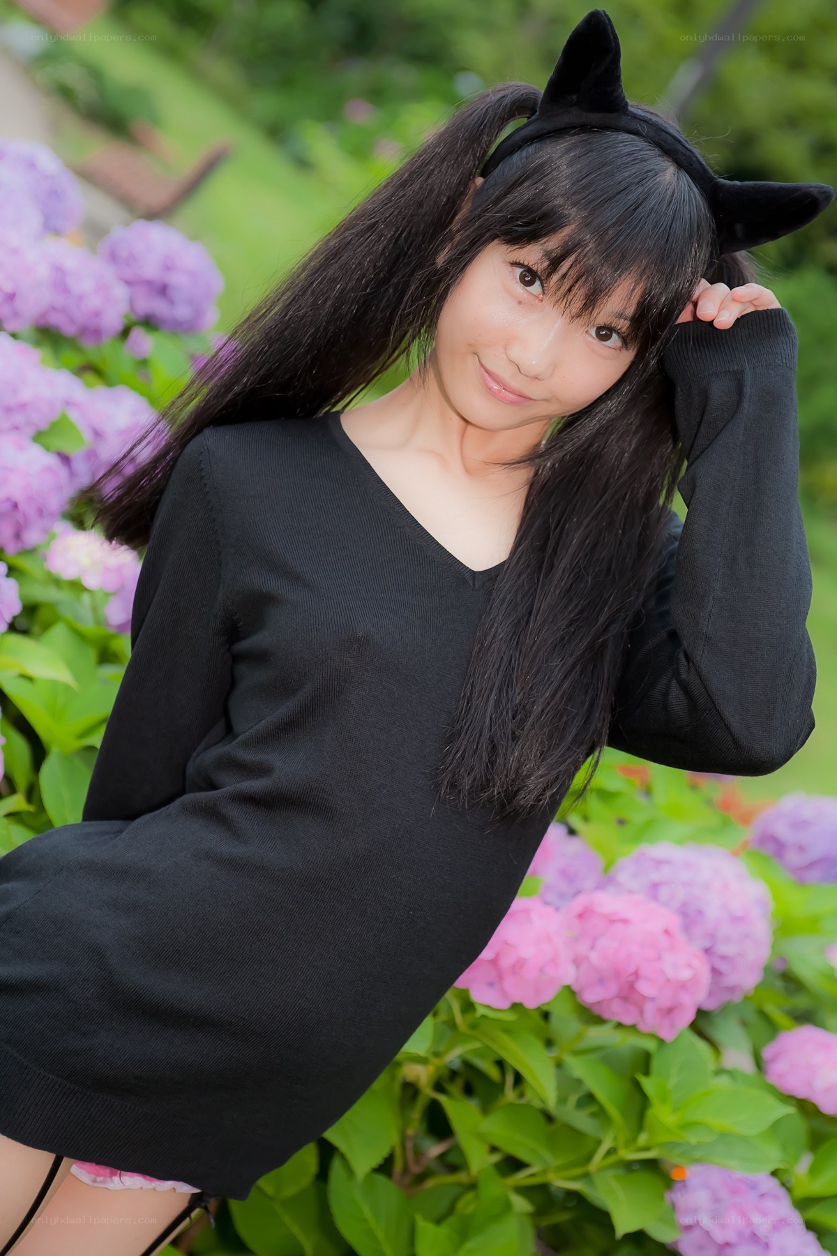 girl in cat ears with hydrangeas