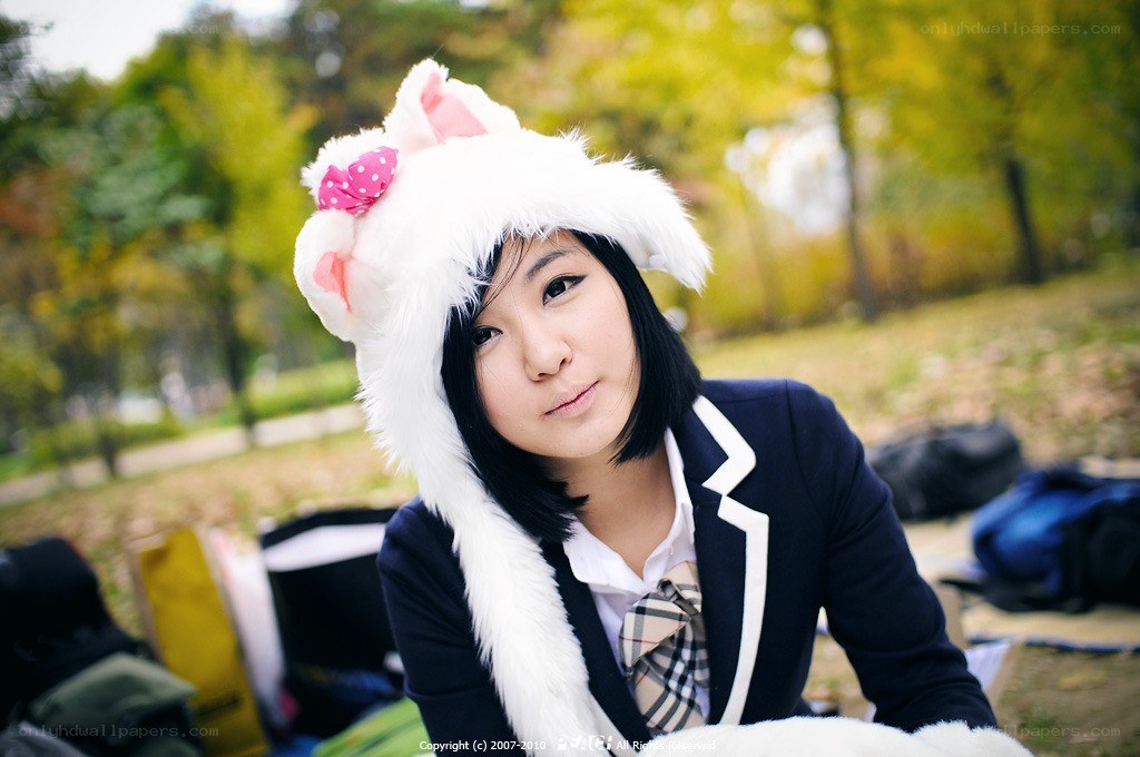 girl in cat hat at park