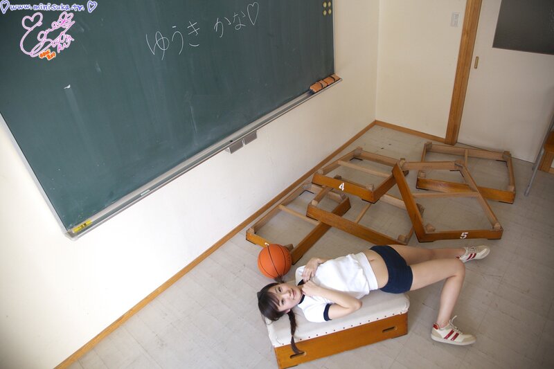 Girl in classroom with basketball