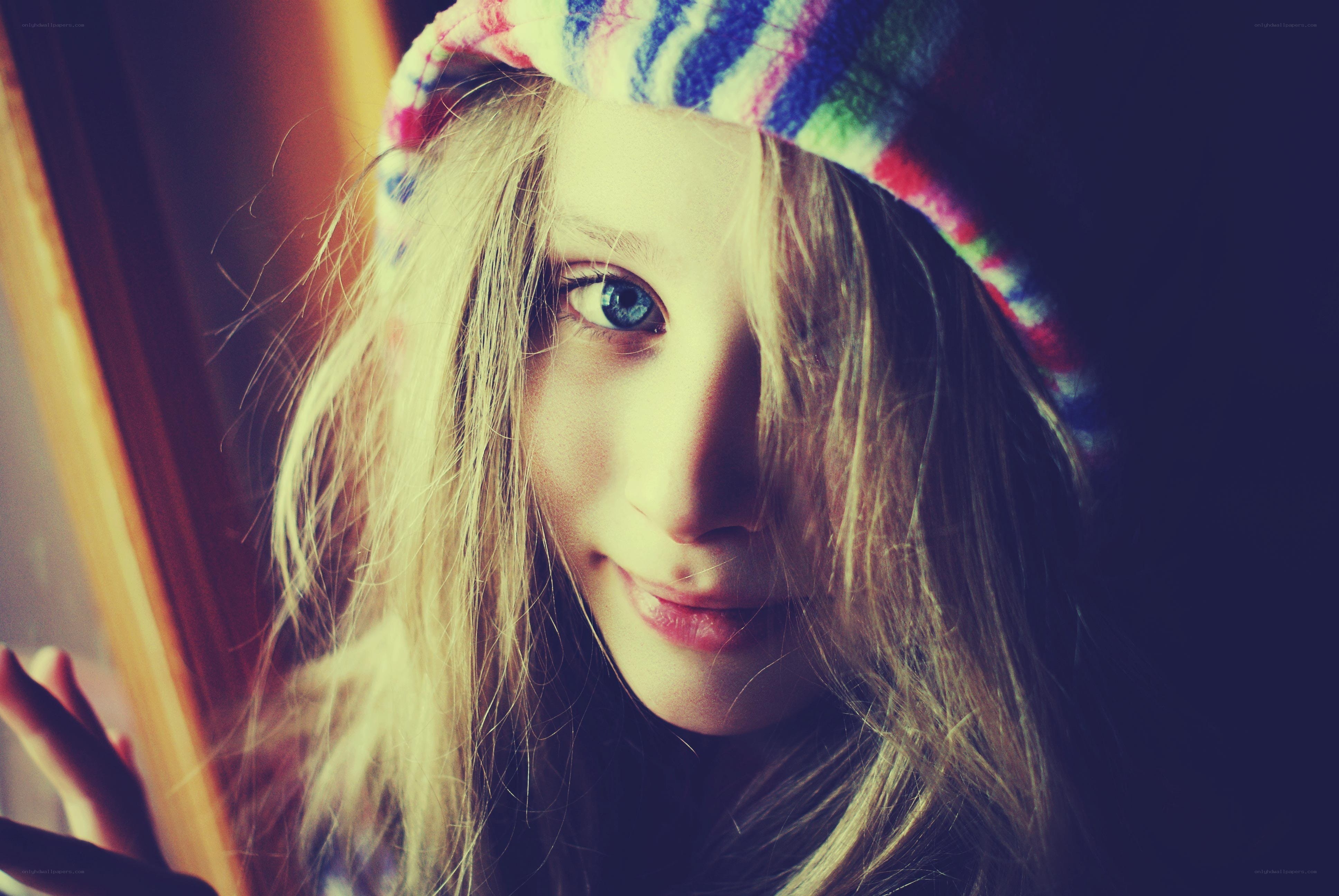 girl in colorful hat
