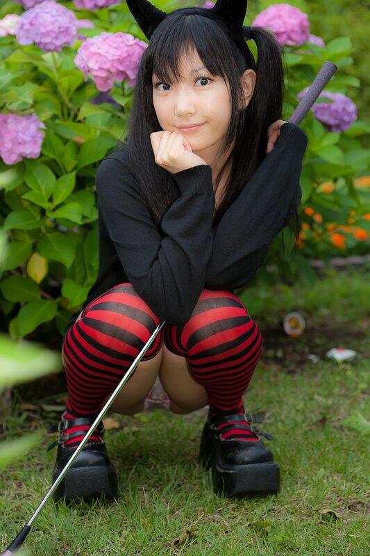 girl in devil costume outdoors