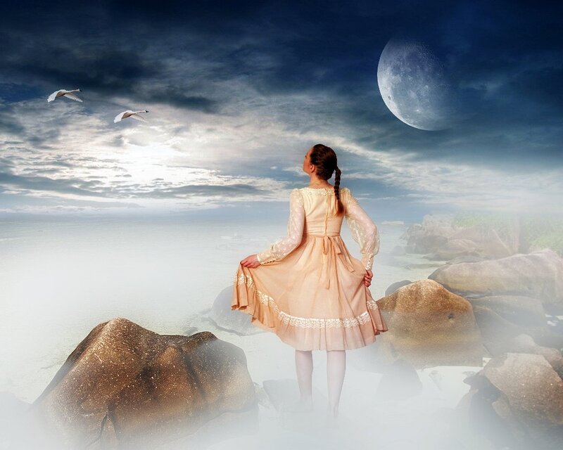 Girl in Dress on Rocks