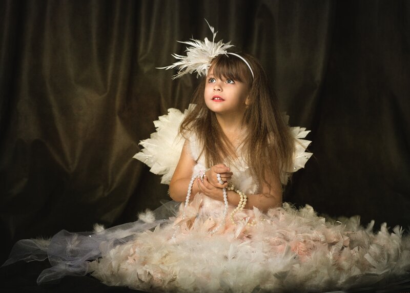 Girl in Feather Costume