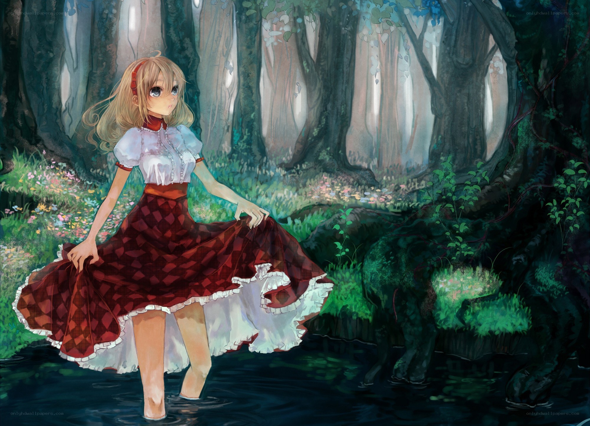 Girl in forest stream