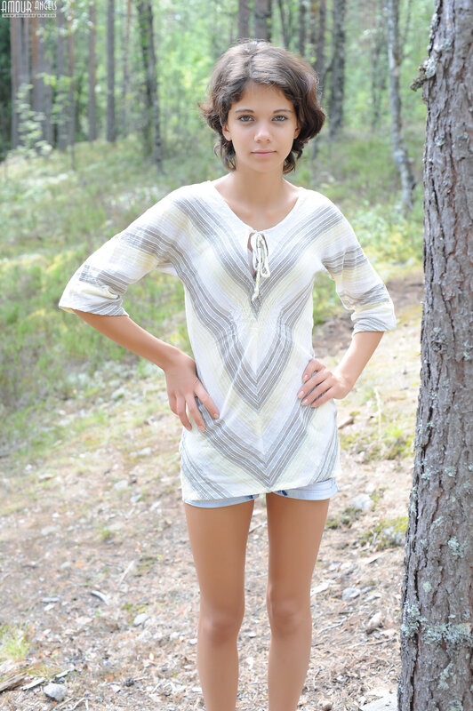 Girl in forest wearing striped top