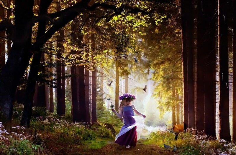 Girl in forest with fox