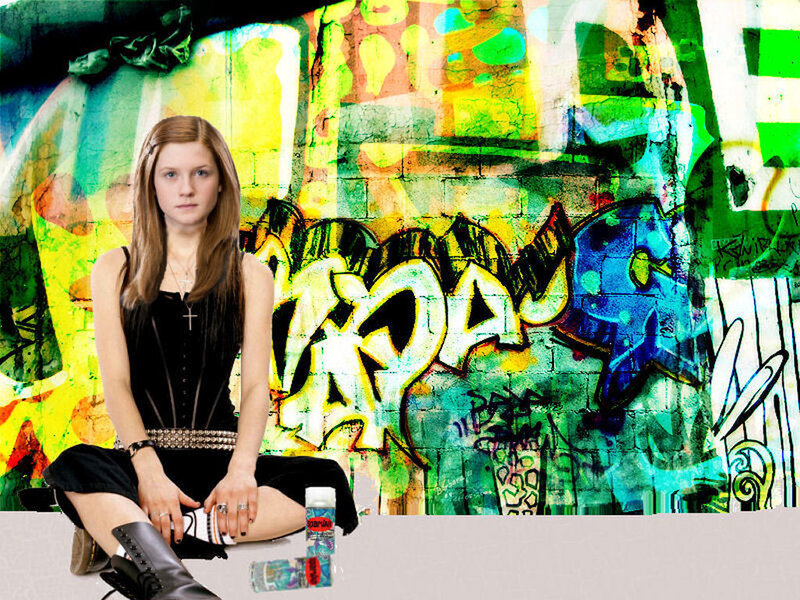 girl in front of graffiti wall