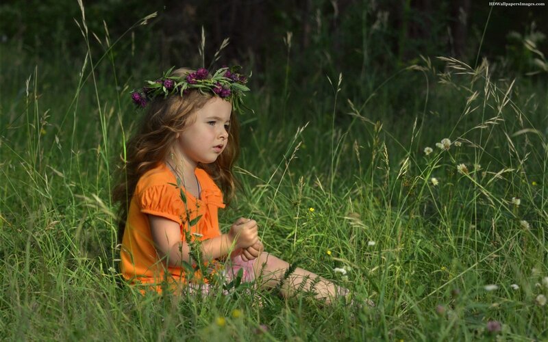 Girl in Grass with Flower Crown